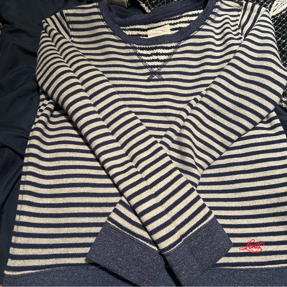 Levi Sweaters size S blue and red. 20$ each